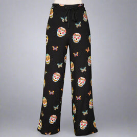 womens black pajama bottoms with sugar skull print black background